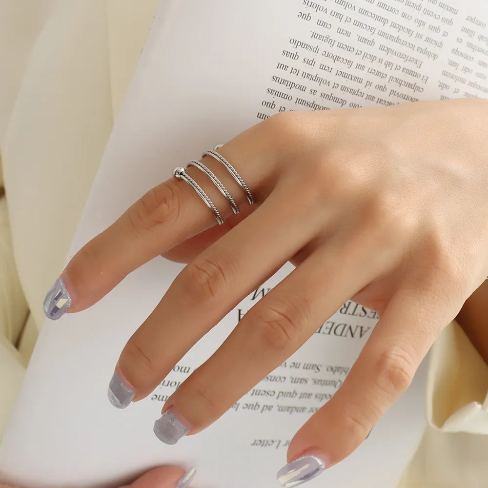 Titanium steel edge ring with unique texture